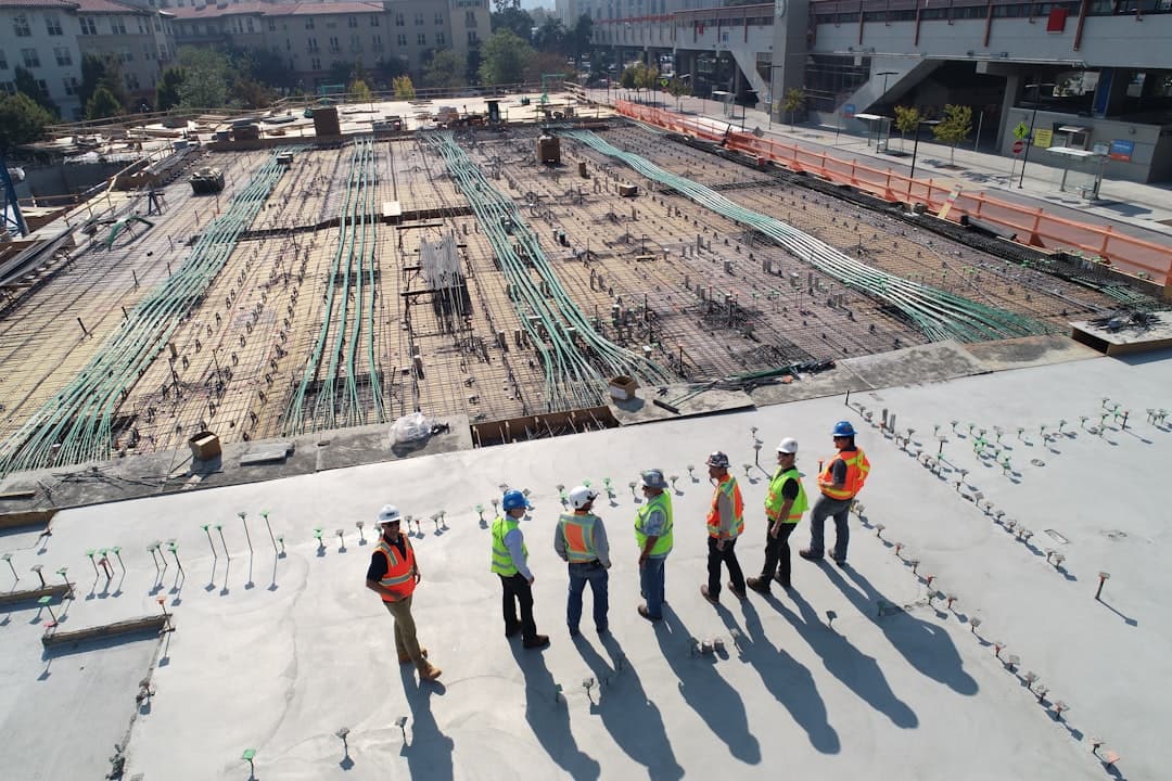 Construction site engineers in safety gear