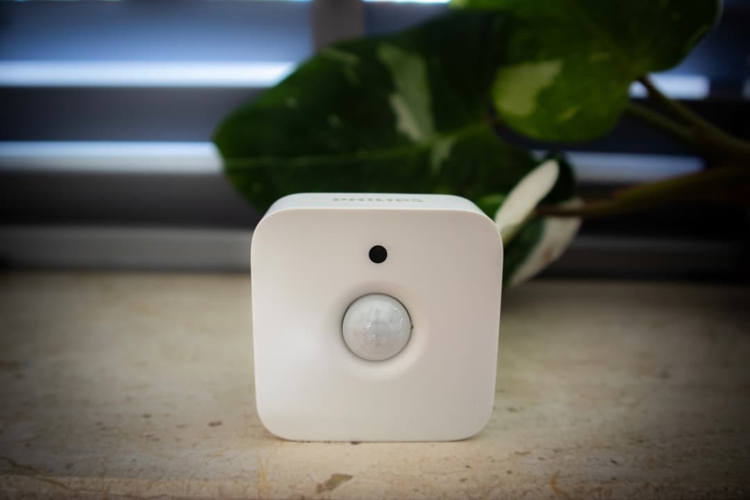 Touchless motion sensor mounted on wall